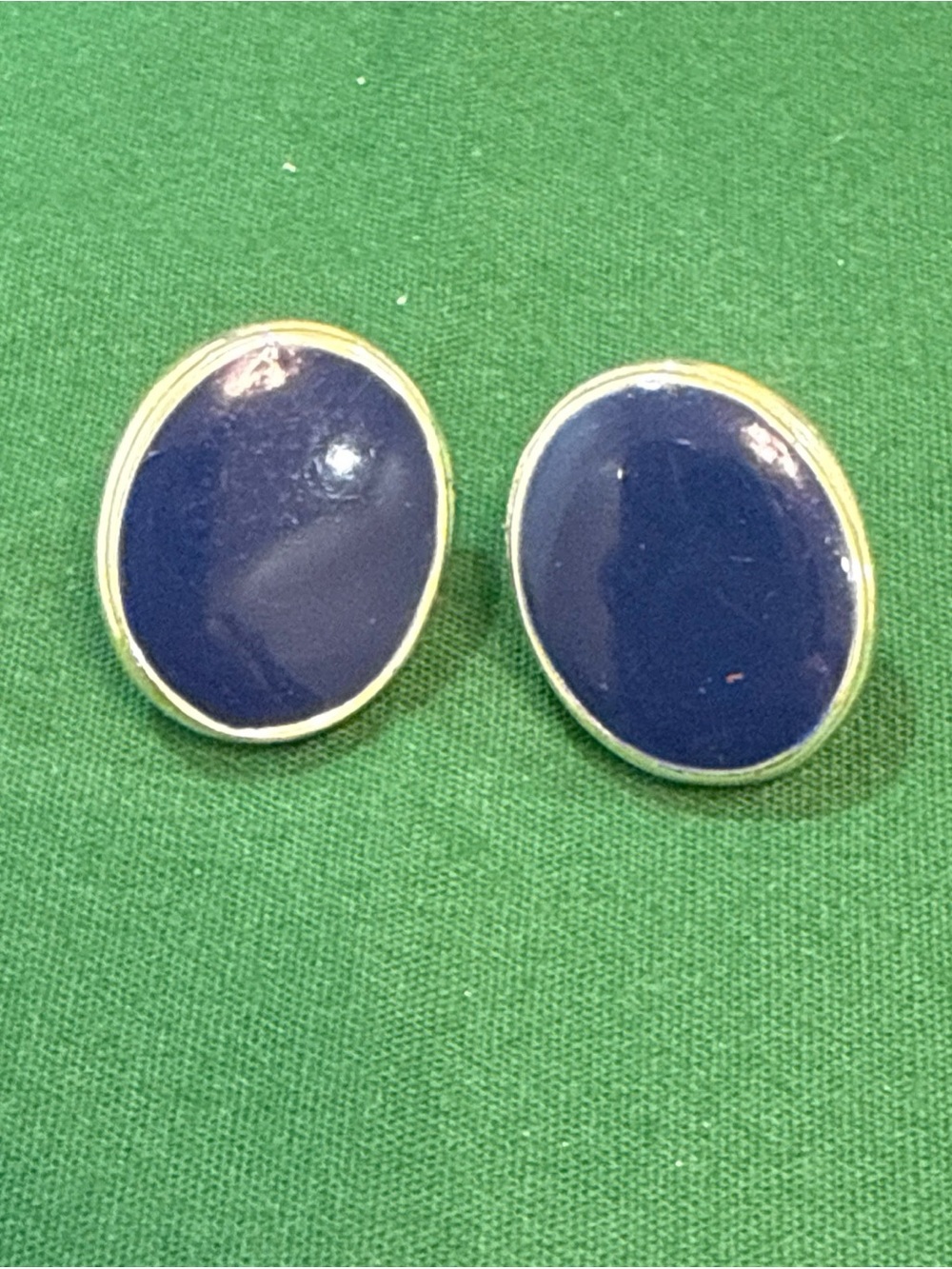 Oval Blue Stone Pierced Earrings Set In Silver Tone Bezel. 111D